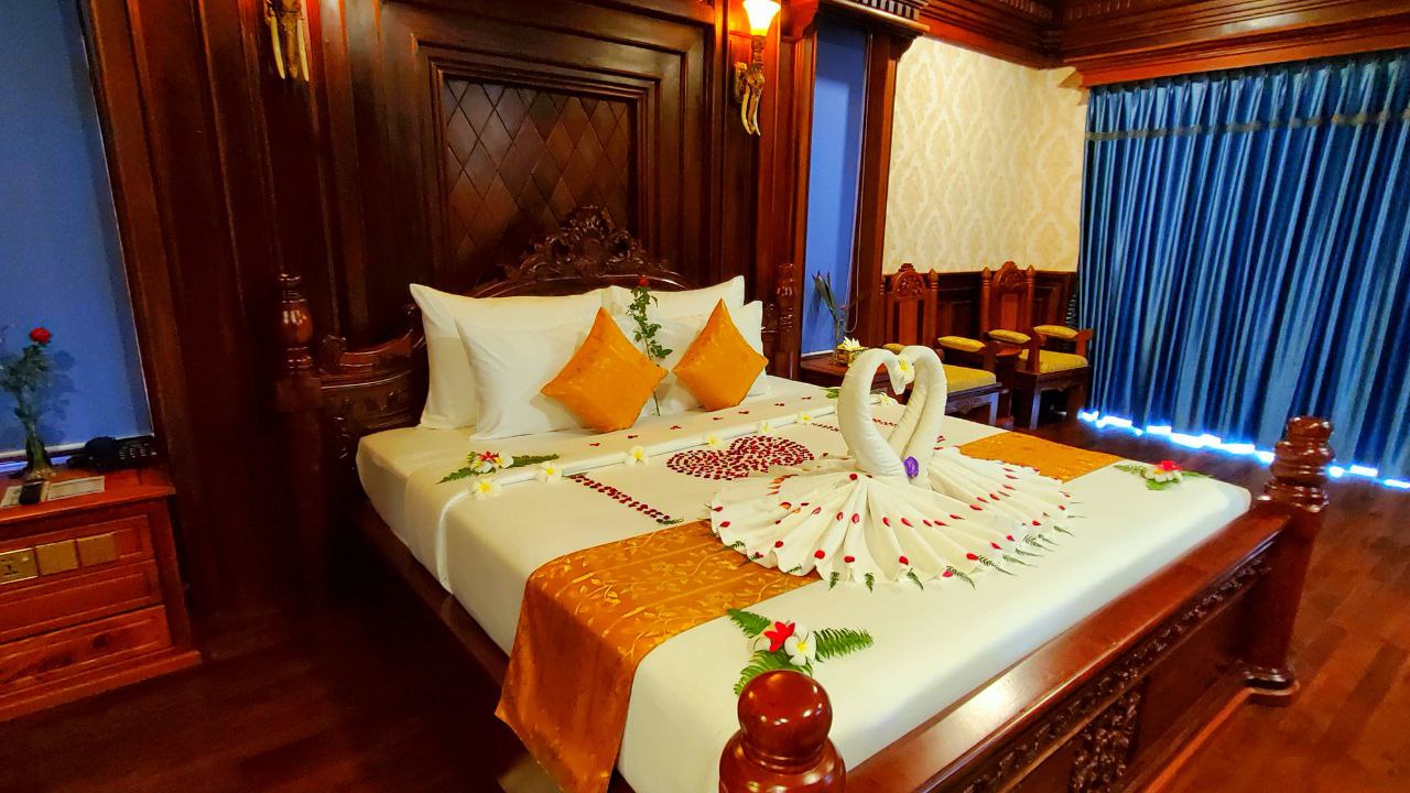 Romantic room setup with swan towels