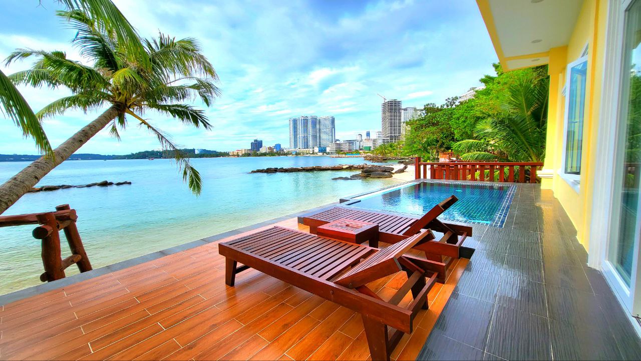 Villa pool deck with city and sea view